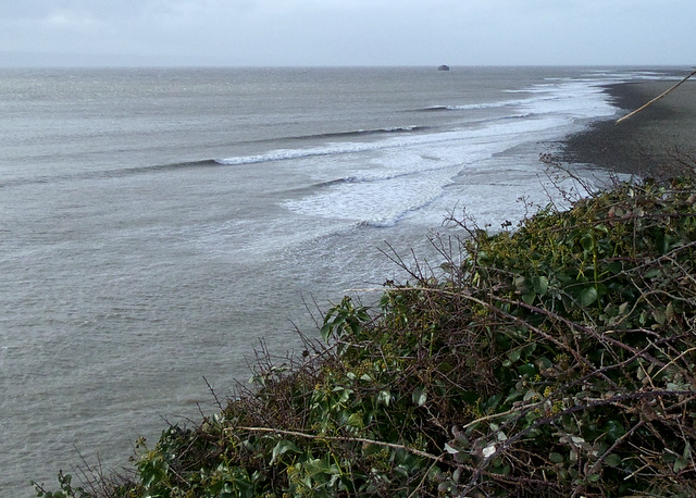 we have a lot of slab rock in certain areas of coast and will a big swell waves does there best point break impression,  here a 30mph cross offshore is fighting it, had to find the wave thats clean, but big enough to actually surf.