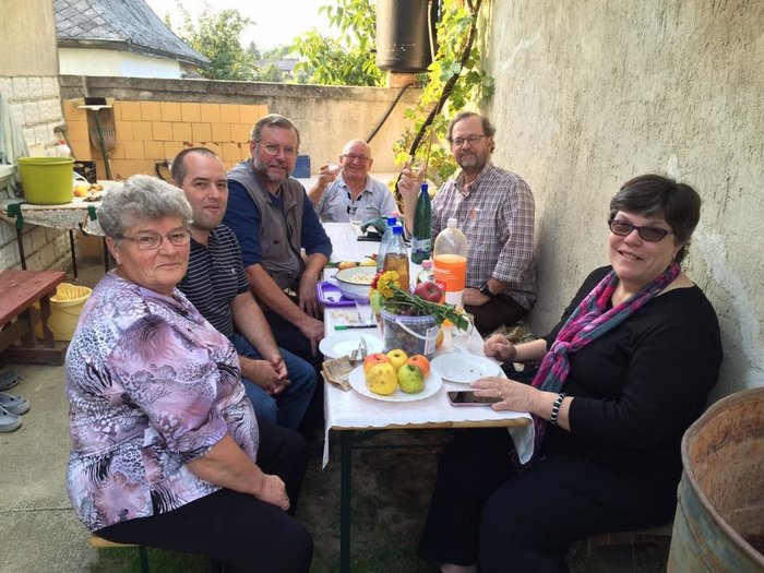 That is me, second from the right, visiting relatives in rural Hungary, in the Bakon area. Uncle Sandor makes a great white wine... walking up to the vineyards and wine cellars is always a treat. In the photo it looks like we are making a toast with some homemade palinka.
