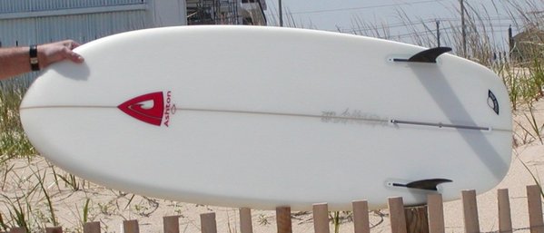 04gdv-bottomview-onside.jpg (70.42 KiB) Viewed 36166 times Note: This board came with these two fins since the the builder didn't have others... they are locked away in my fin storage compartment. I did try them out, in N. Oregon, but quickly caught a wave in and switched them out.